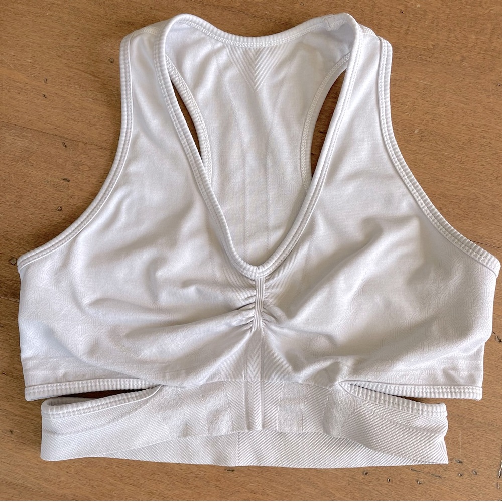 Alphalete sports bra.  Size medium.  Light lilac colour.